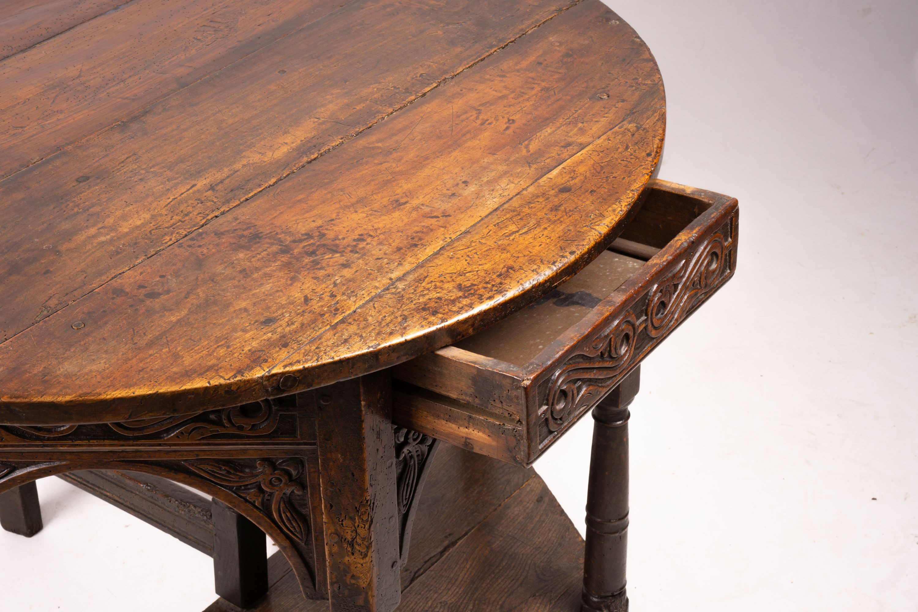 A 17th century oak credence table, width 108cm, depth 52cm, height 77cm